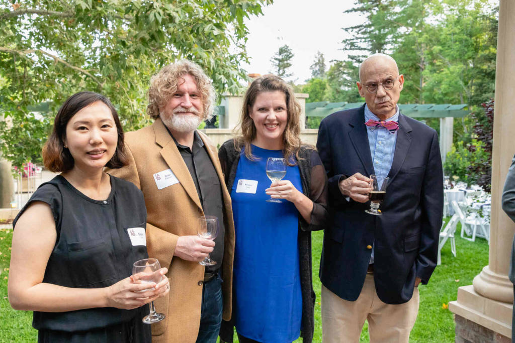 LARB Noir Editor Steph Cha with guests and James Ellroy at the LARB Luminary Dinner, Coriolis client event